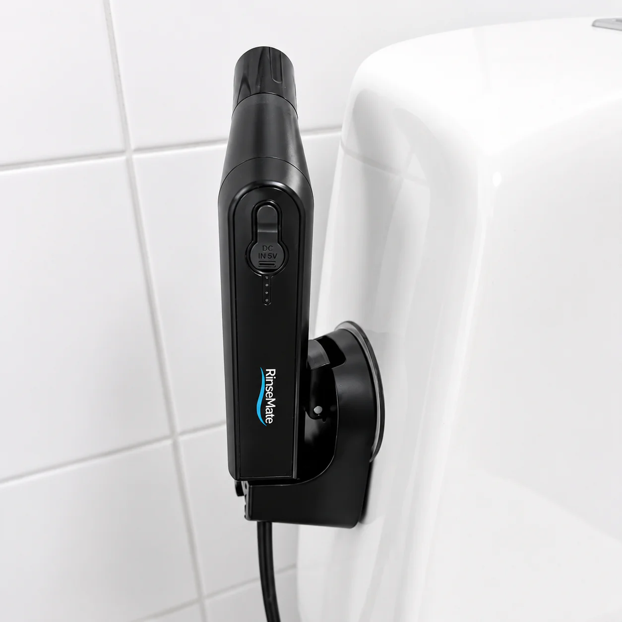 Portable bidet handle in its holder
